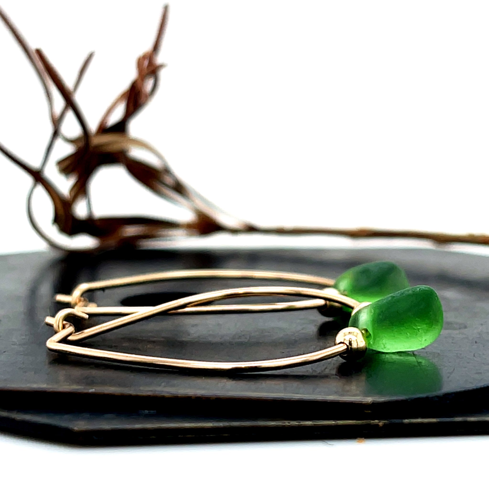 green earrings gold hoops