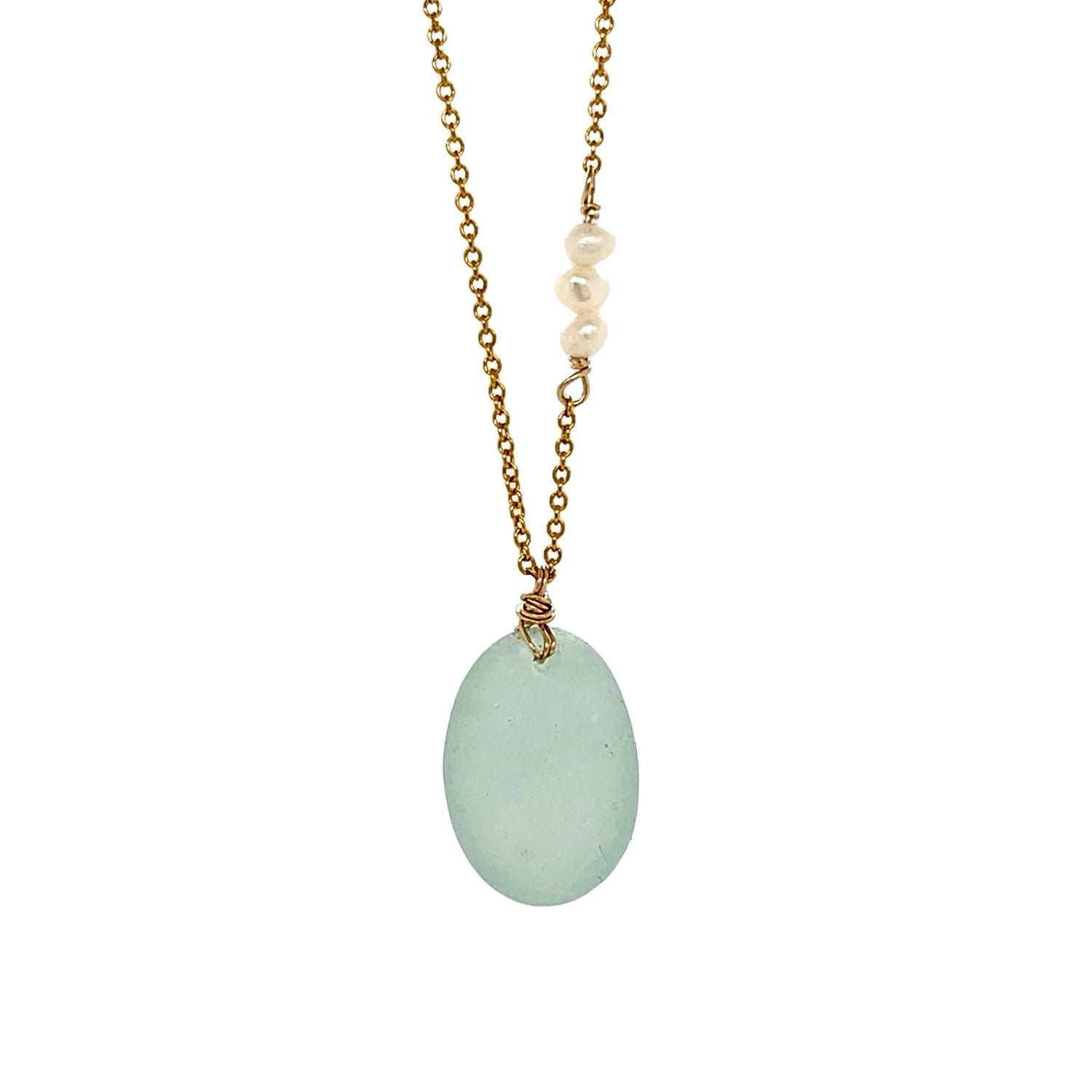 Seafoam sea glass necklace on a fine gold-filled chain with a freshwater pearl detail, handmade coastal jewellery.