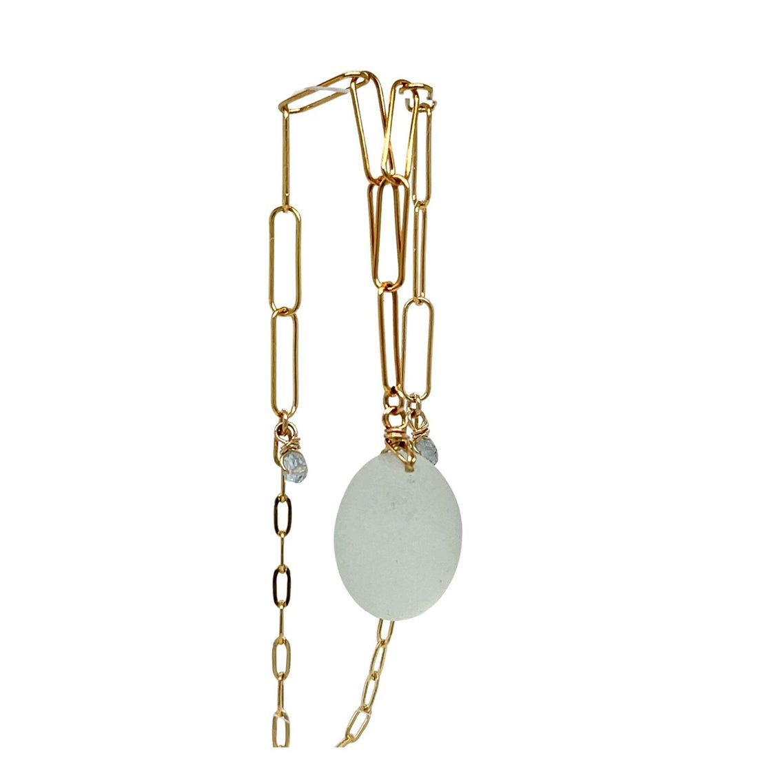 Detail of dual gold paperclip chains joined with fine sparkle links