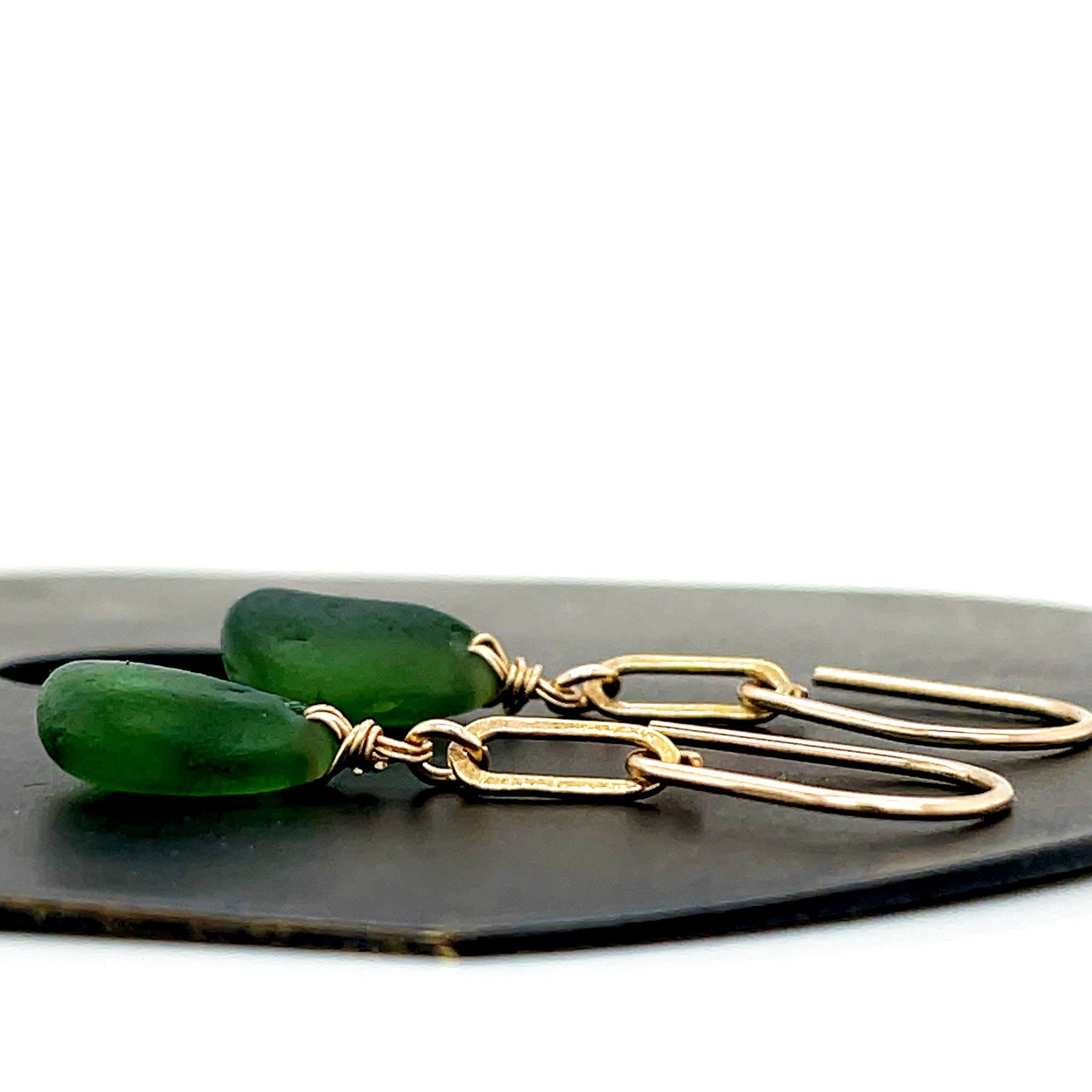 Green glass dangle earrings with matte gold rectangles