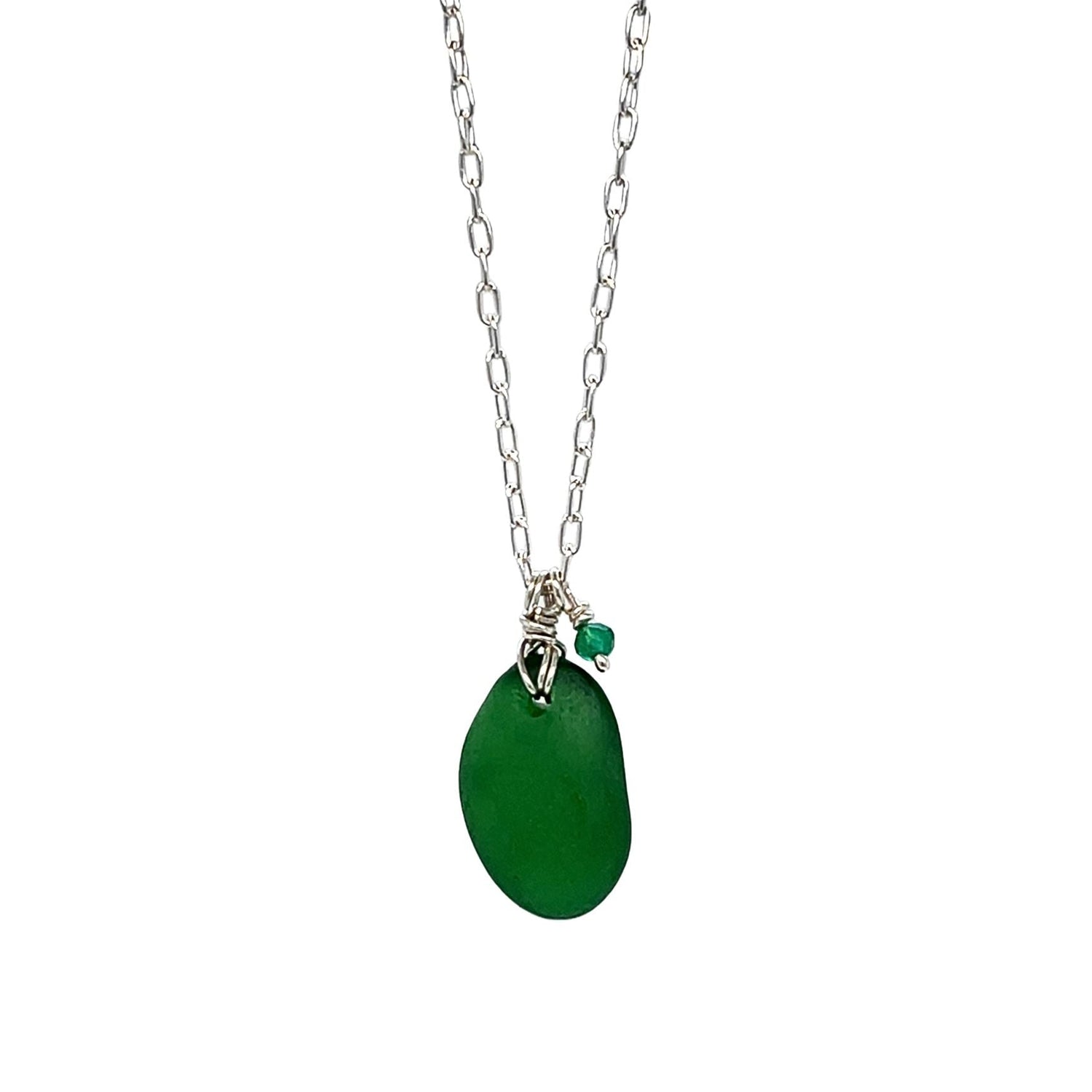 Close-up of green sea glass pendant and sterling silver chain