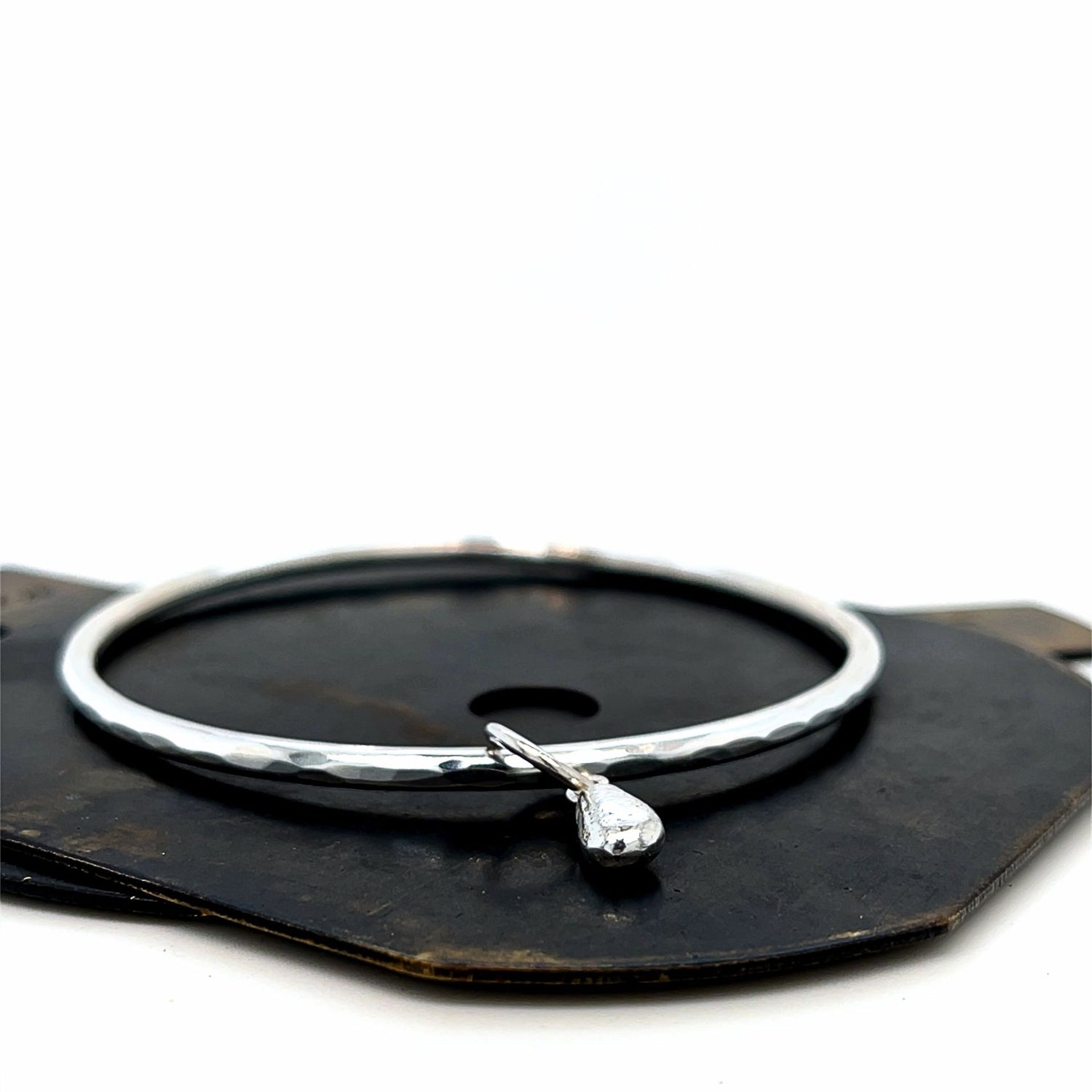 hammered silver bangle and charm