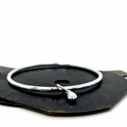 hammered silver bangle and charm