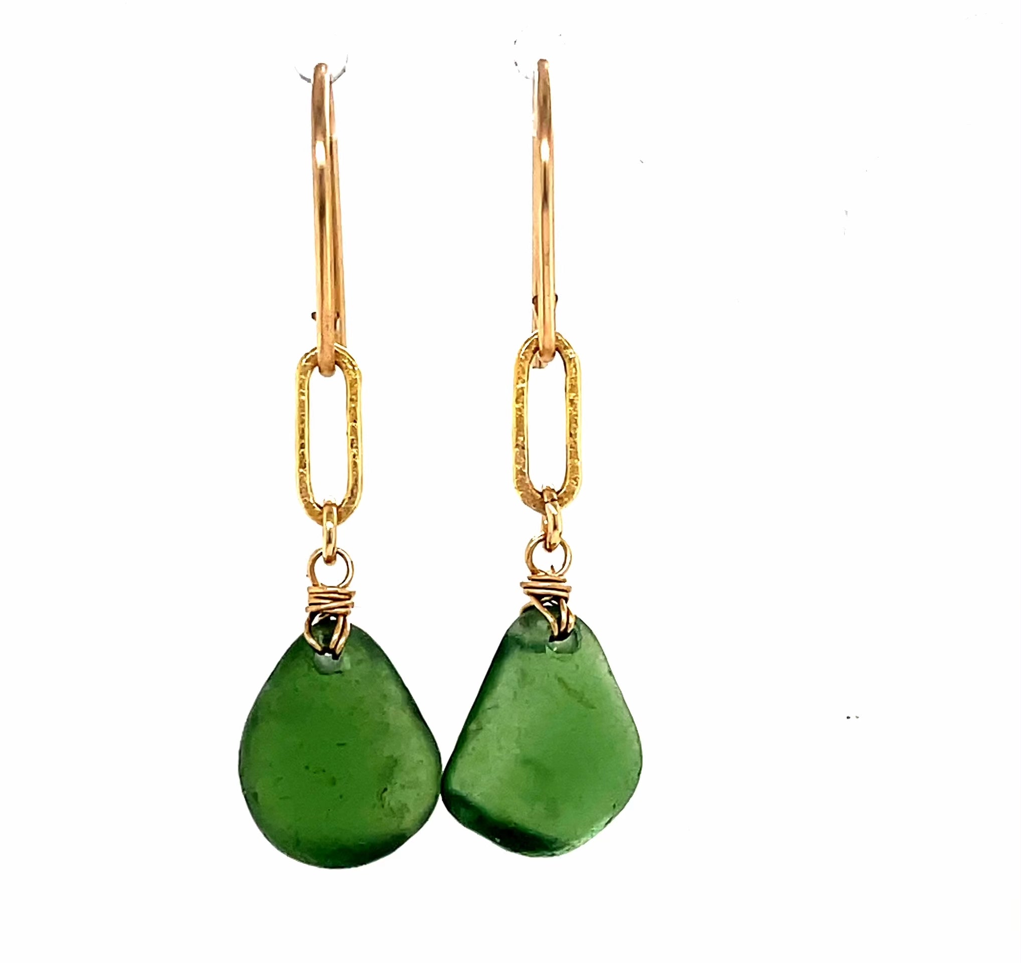 Minimalist green glass earrings in a sleek rectangle shape, complemented by matte gold details