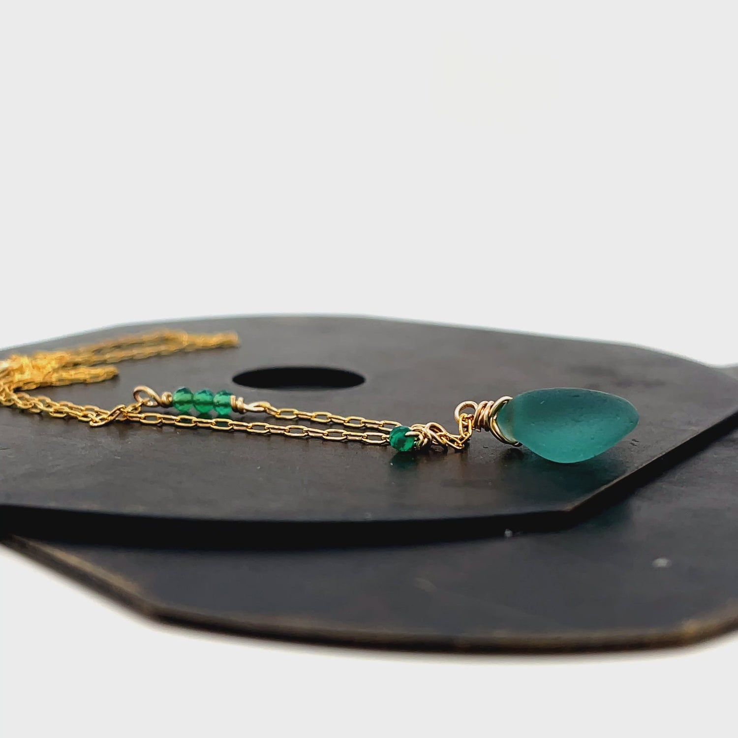 Sea green glass and onyx gold necklace by Kriket Broadhurst