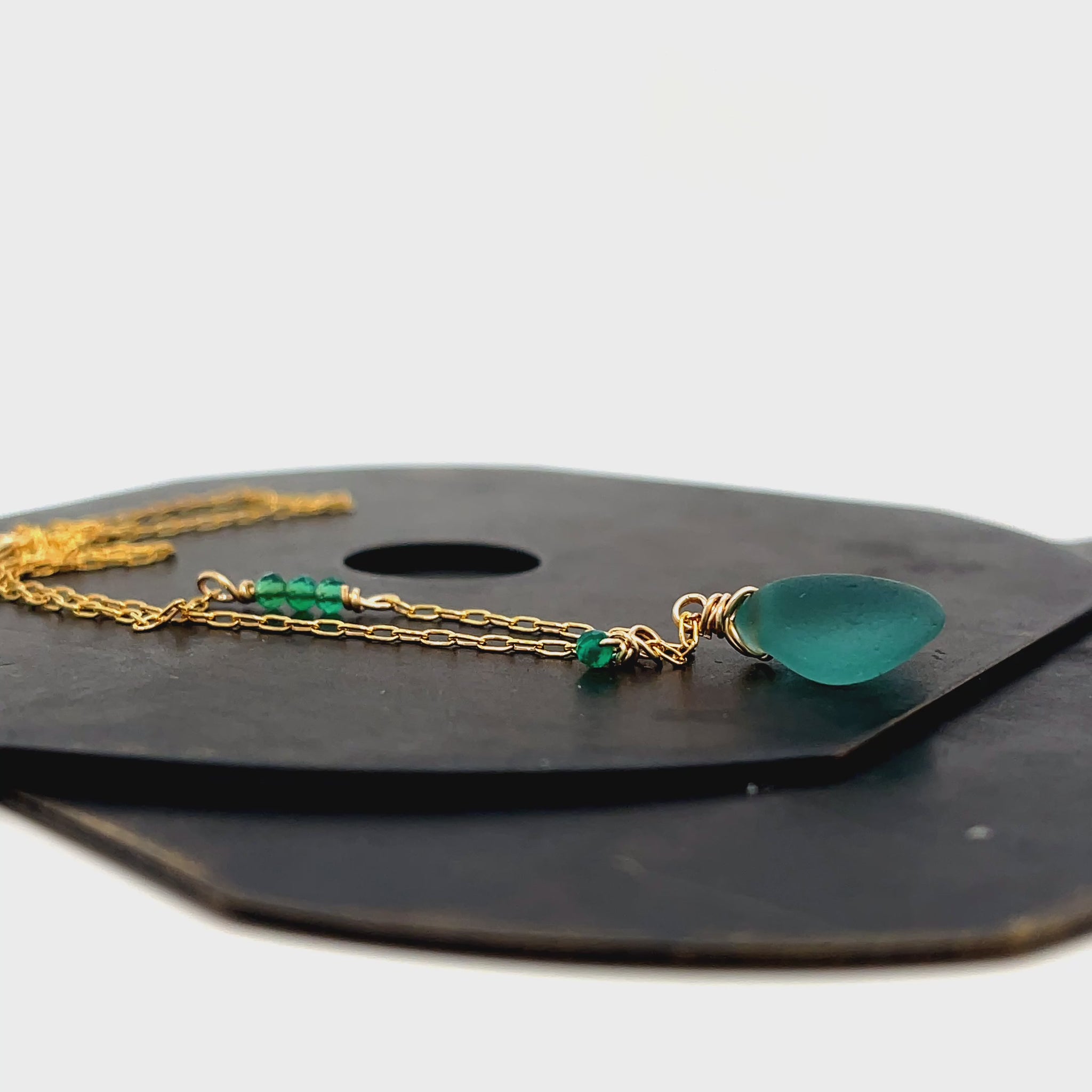 Sea green glass and onyx gold necklace by Kriket Broadhurst