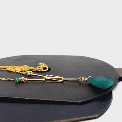 Close-up of green onyx accent beads and feature chain detail