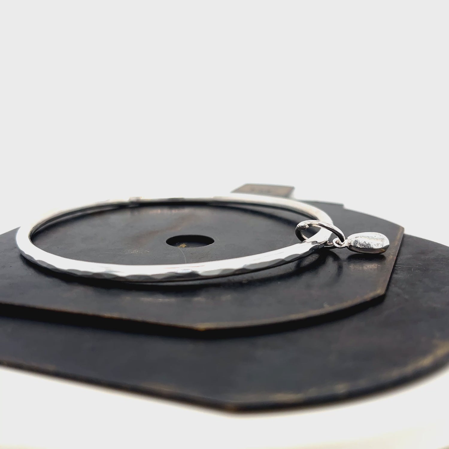 Coastal-inspired sterling silver bangle by Kriket Broadhurst