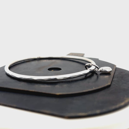 Coastal-inspired sterling silver bangle by Kriket Broadhurst