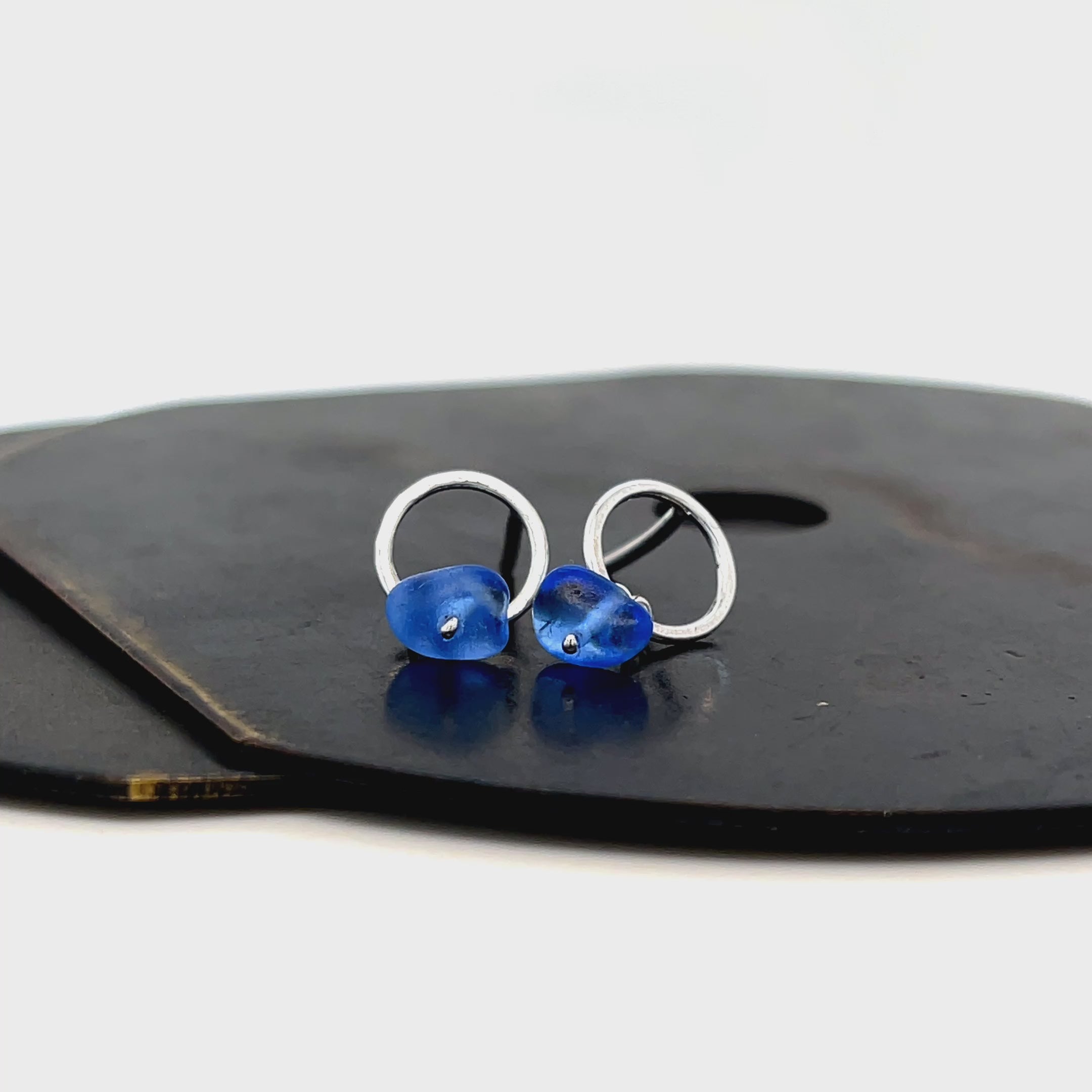 Tiny blue sea glass earrings on sterling silver circle studs