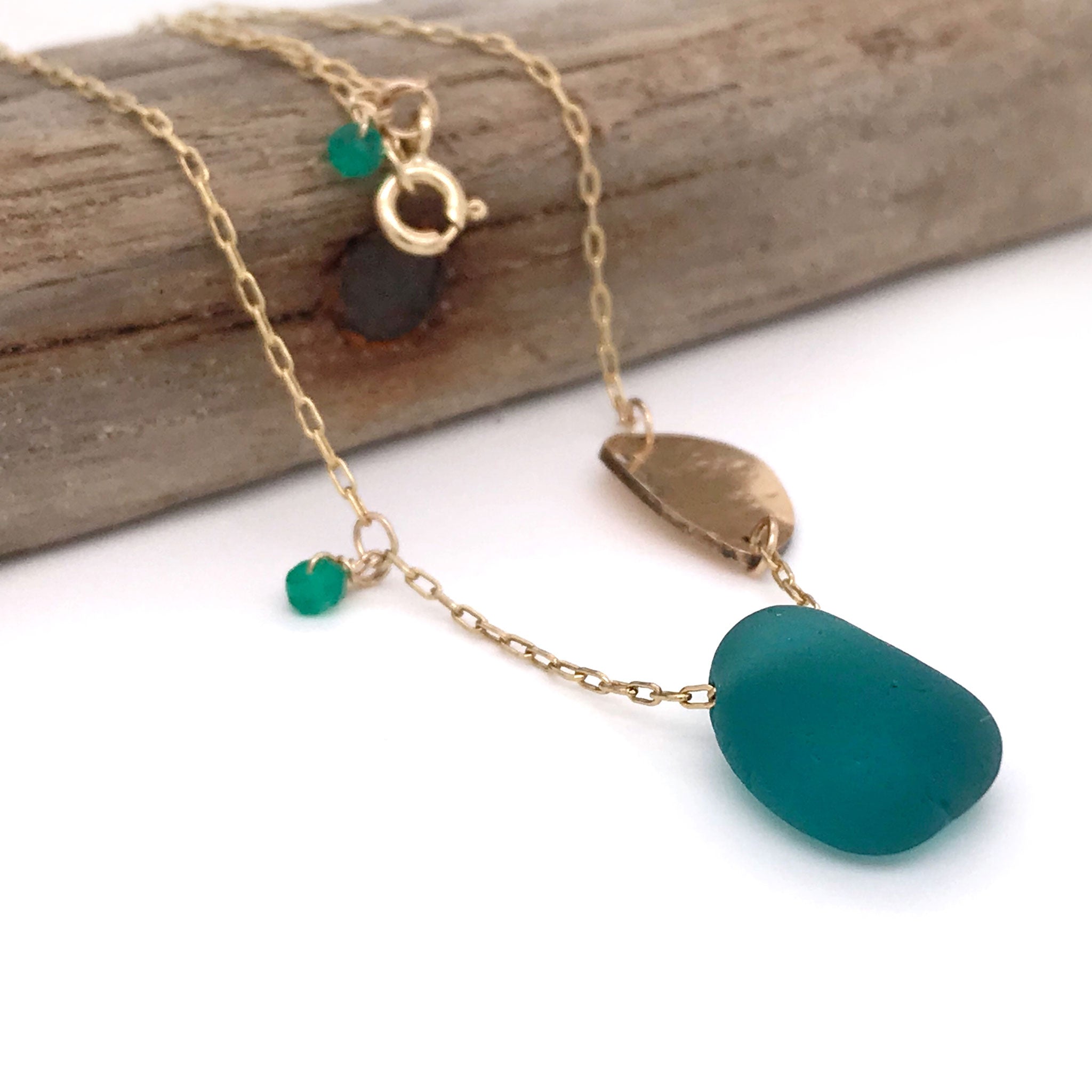 gold necklace with teal seaglass and leaf charm kriket Broadhurst jewellery