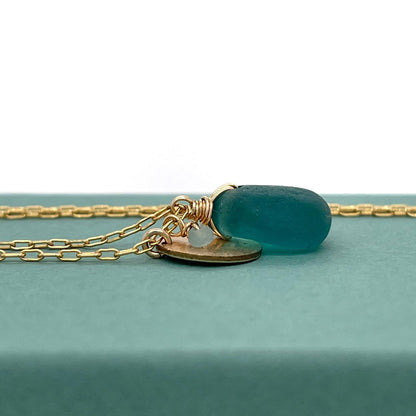 teal-necklace-seaglass-with-gold-disc-charm-kriket-broadhurst-jewellery